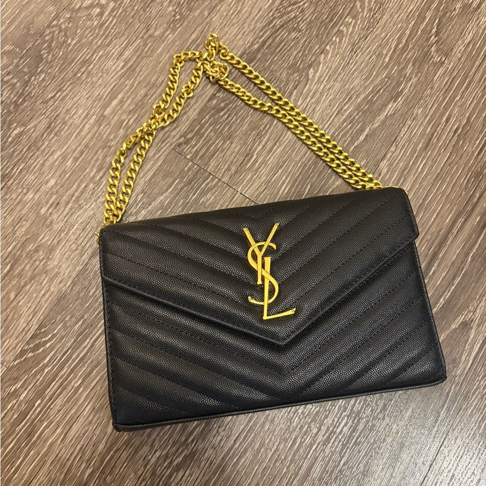 Yves Saint Laurent Black and Gold Quilted Clutch